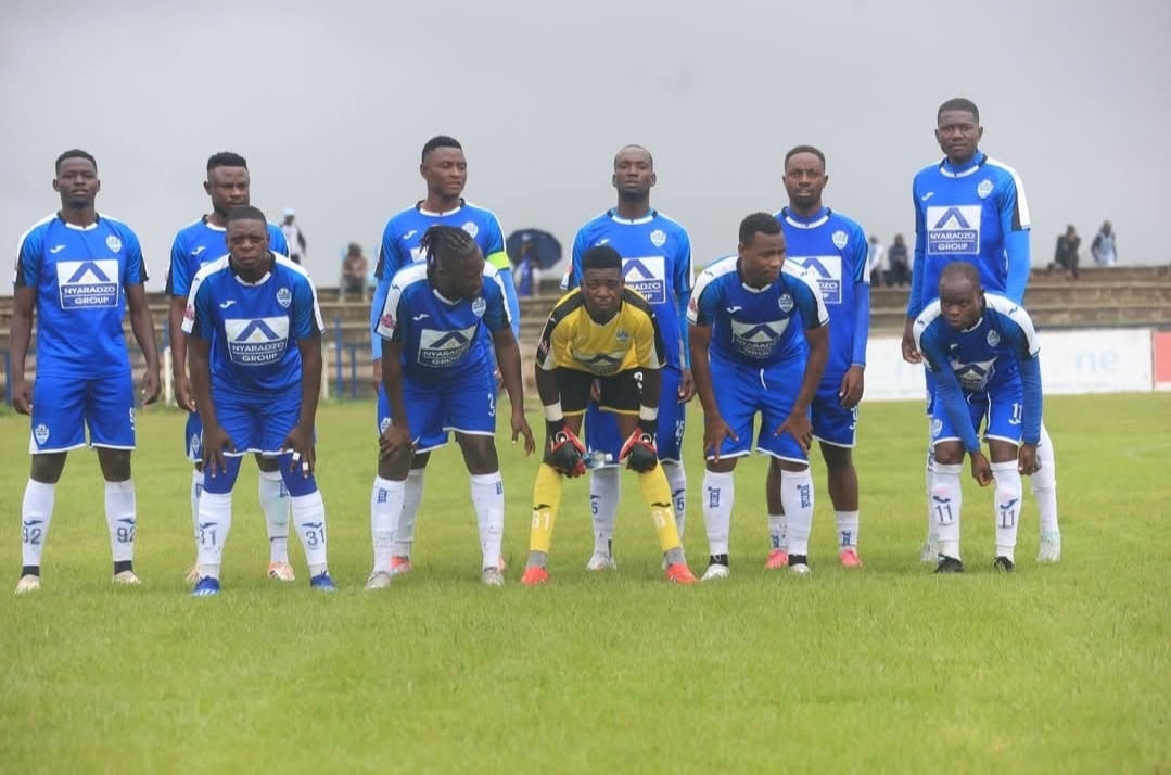 TelOne FC players pose for a photo at Ascot stadium