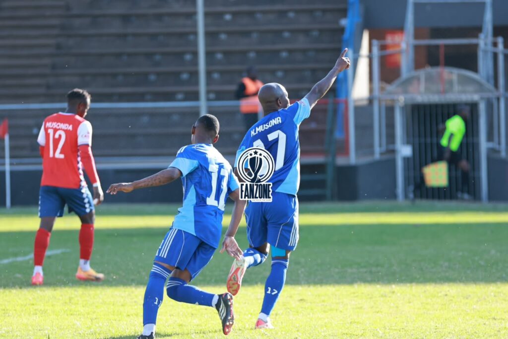 Knowledge Musona and Khama Billiat celebrating