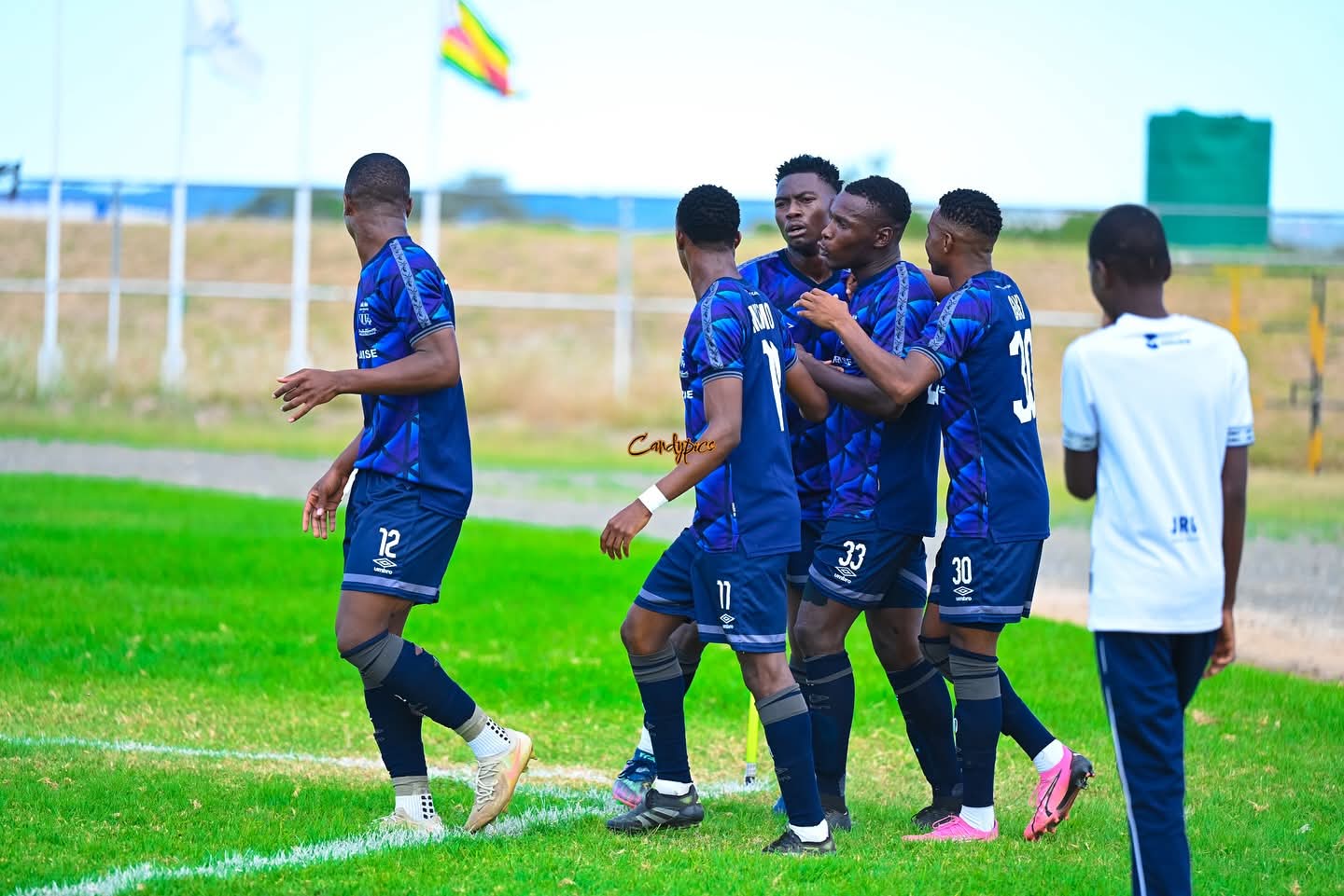 Ngezi Platinum Stars FC players celebrating a goal at Baobab stadium