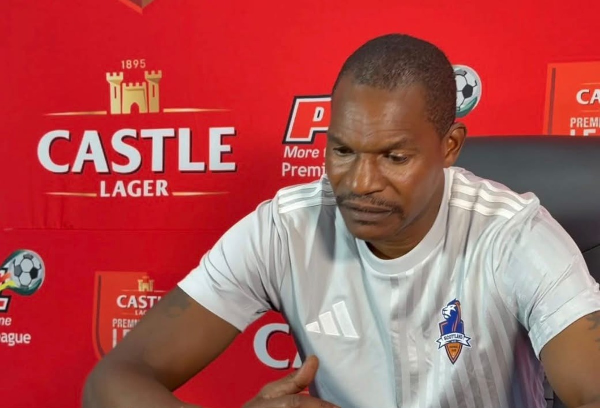 Norman Mapeza in a during a press conference